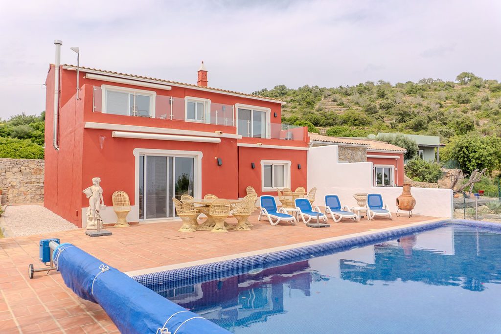 Estoi country estate — the main house and pool terrace with countryside views