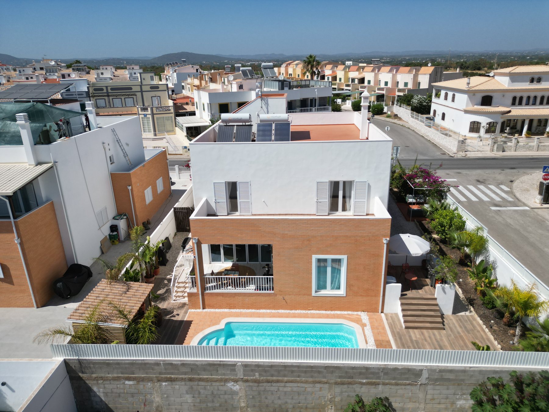 Aerial view of a five-bedroom villa with heated pool for sale in Fuseta, Eastern Algarve