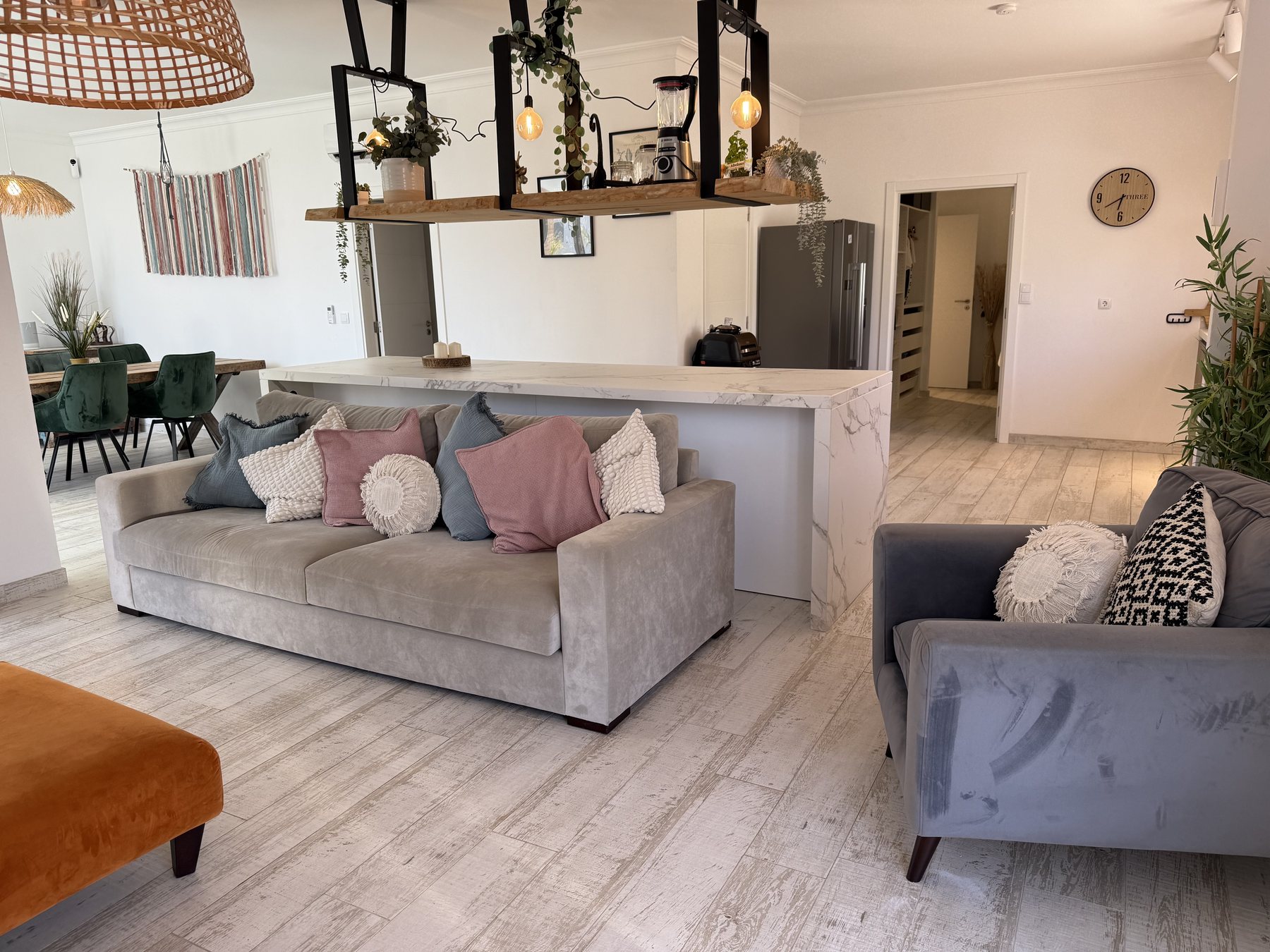Fuseta villa — open living room with sofas and views