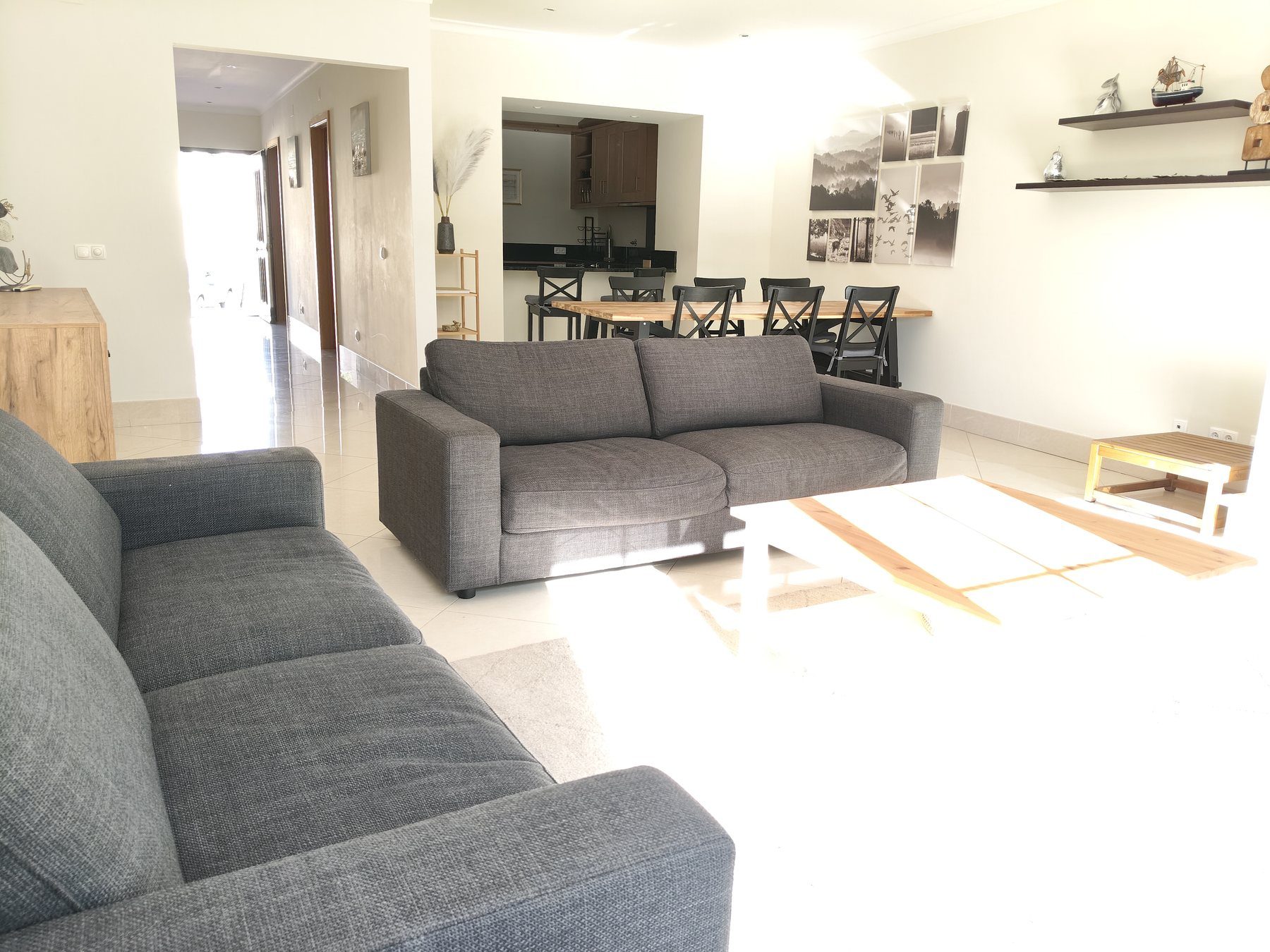 Open-plan living and dining area connecting to the garden terrace