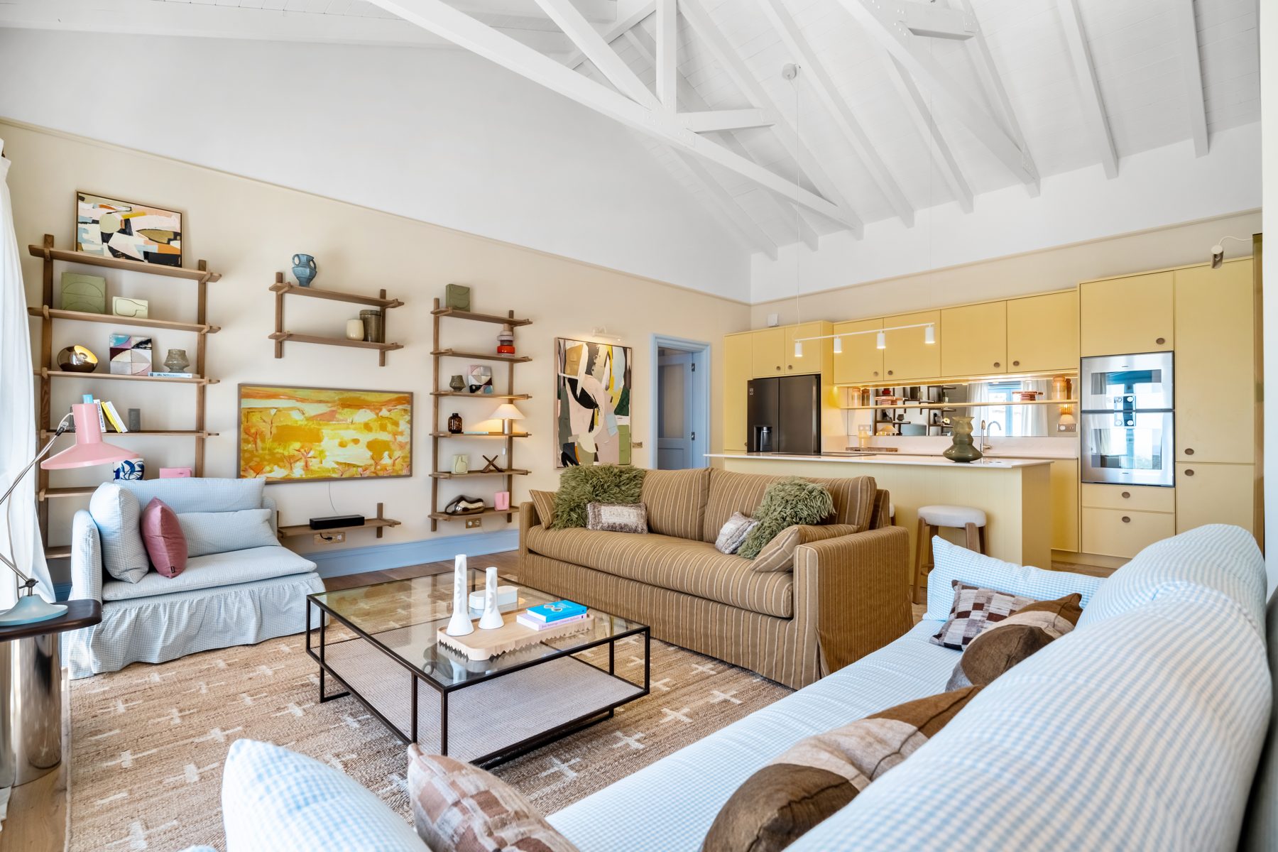 Santa Bárbara de Nexe — living room under a vaulted beamed ceiling
