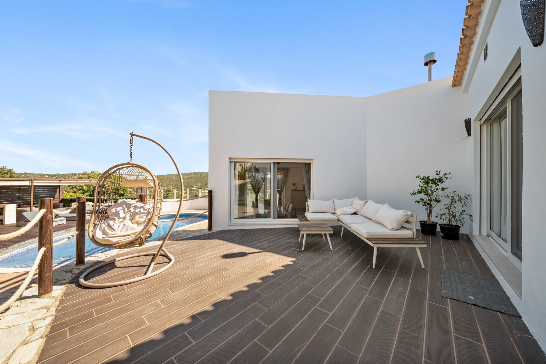 São Brás Villa — deck with fire pit and hanging chair