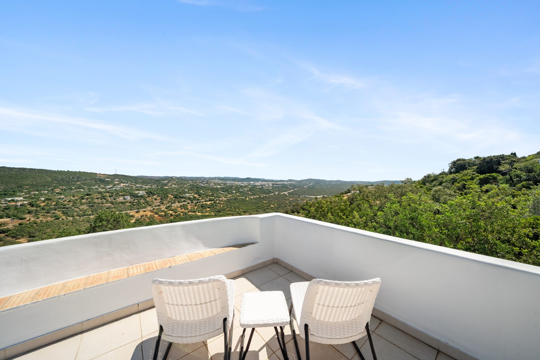 Roof terrace with a west-facing view across the hills above São Brás de Alportel
